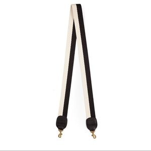 Clare V. black and cream bag strap.